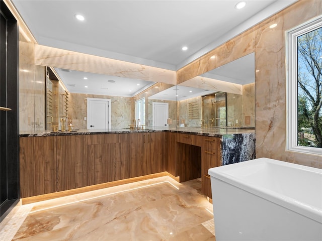 5 N Hills Rd, East Norwich, NY 11732 - full bath with marble tiled flooring, a soaking tub, double vanity, and recessed lighting