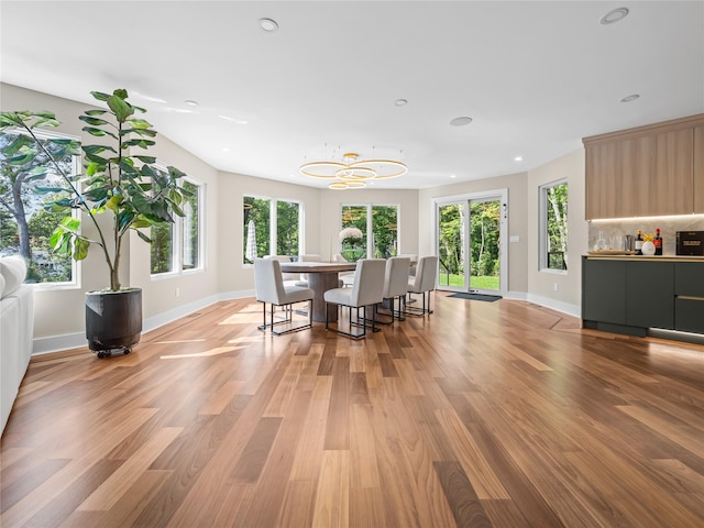 5 N Hills Rd, East Norwich, NY 11732 - dining room with a chandelier, recessed lighting, baseboards, and light wood-type flooring