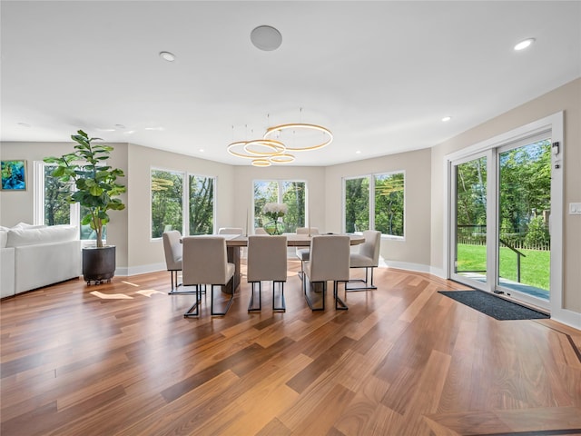 5 N Hills Rd, East Norwich, NY 11732 - dining room with recessed lighting, baseboards, light wood-type flooring, and a chandelier