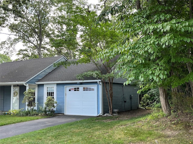 140A Laurance Ln, Ridge, NY 11961 - garage featuring asphalt driveway