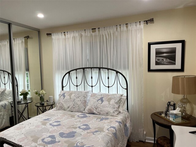 140A Laurance Ln, Ridge, NY 11961 - bedroom featuring wood finished floors, recessed lighting, and a closet