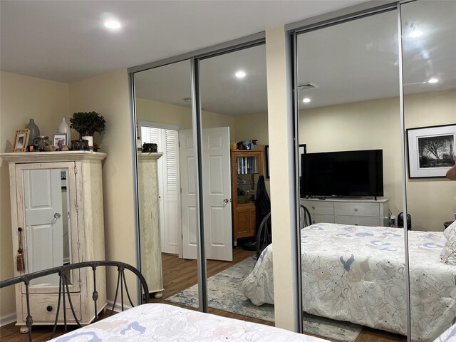 140A Laurance Ln, Ridge, NY 11961 - bedroom with wood finished floors and two closets