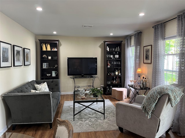 140A Laurance Ln, Ridge, NY 11961 - living area with wood finished floors, baseboards, and recessed lighting