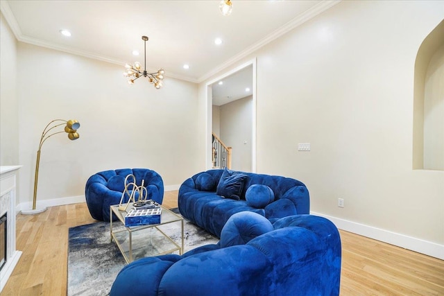 260 Main St, Goshen, NY 10924 - living area featuring a tile fireplace, an inviting chandelier, stairs, light wood-type flooring, and recessed lighting