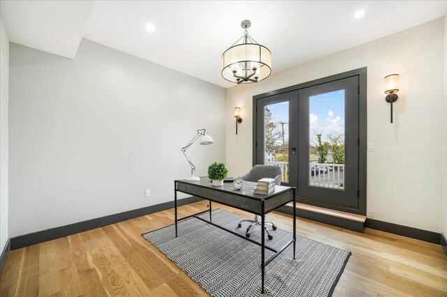 260 Main St, Goshen, NY 10924 - office featuring baseboards, a notable chandelier, french doors, and light wood-type flooring