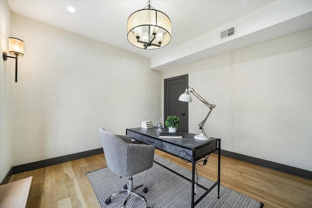 260 Main St, Goshen, NY 10924 - home office featuring an inviting chandelier, visible vents, wood finished floors, and baseboards