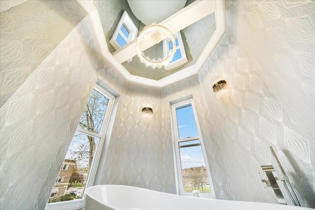 260 Main St, Goshen, NY 10924 - bathroom featuring a soaking tub and a towering ceiling