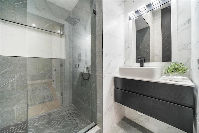 260 Main St, Goshen, NY 10924 - full bath featuring a tile shower, tile walls, double vanity, and a sink