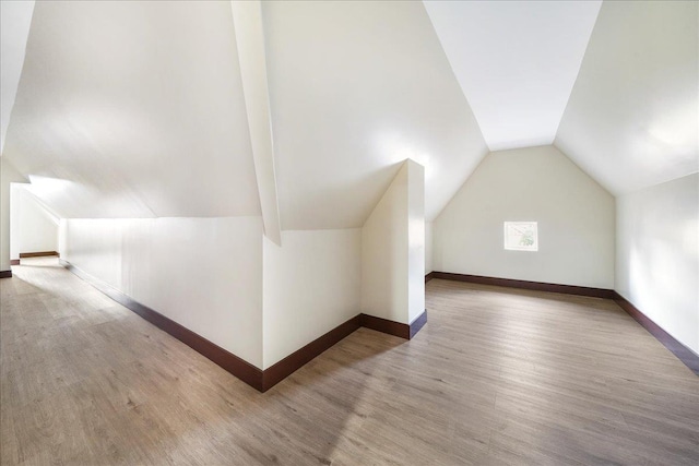 260 Main St, Goshen, NY 10924 - bonus room featuring vaulted ceiling, baseboards, and wood finished floors