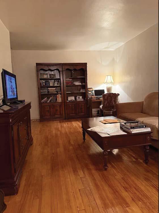 living area featuring hardwood / wood-style floors