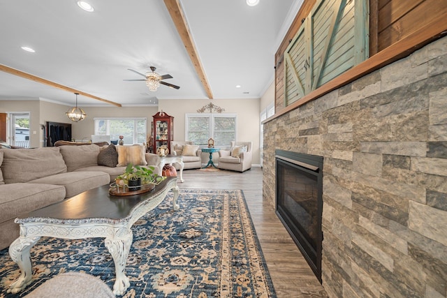 142 Rte 25a, Shoreham, NY 11786 - living room featuring a glass covered fireplace, beam ceiling, a ceiling fan, wood finished floors, and recessed lighting