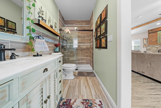 142 Rte 25a, Shoreham, NY 11786 - bathroom with vanity, a shower stall, wood finished floors, and toilet