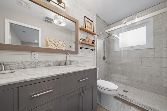 142 Rte 25a, Shoreham, NY 11786 - full bath featuring toilet, a stall shower, and double vanity