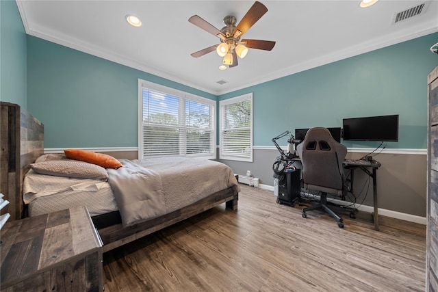 142 Rte 25a, Shoreham, NY 11786 - bedroom with ornamental molding, baseboards, wood finished floors, recessed lighting, and ceiling fan