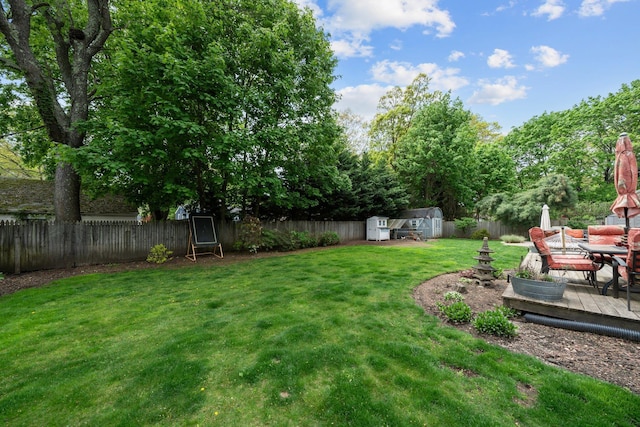 142 Rte 25a, Shoreham, NY 11786 - view of yard with a storage shed, an outdoor structure, and outdoor dining space