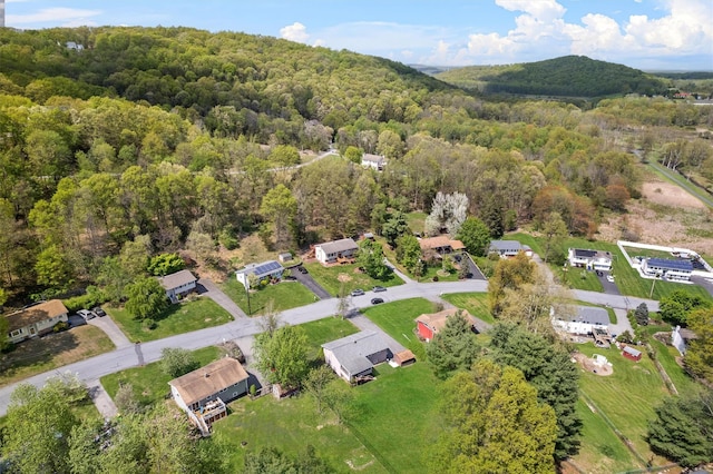 aerial view featuring a residential view and a view of trees