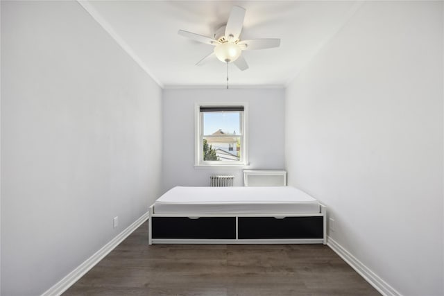 43-28 196th St, Flushing, NY 11358 - bedroom with ceiling fan, wood finished floors, baseboards, radiator, and ornamental molding