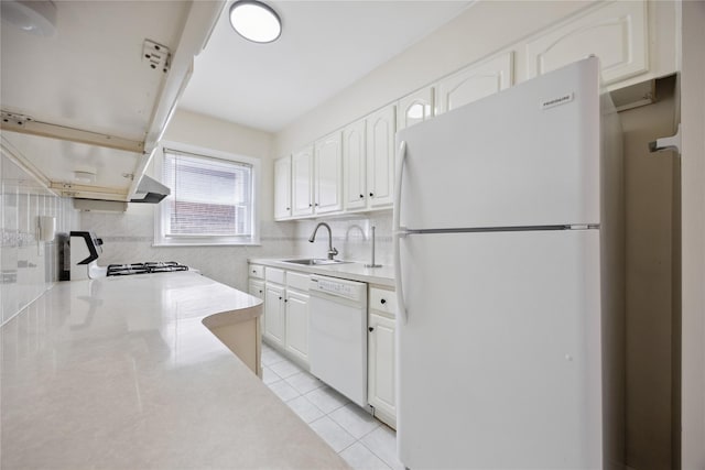 43-28 196th St, Flushing, NY 11358 - kitchen with backsplash, a sink, light tile patterned floors, white cabinets, and white appliances