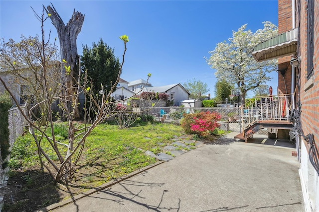 43-28 196th St, Flushing, NY 11358 - view of yard with a fenced backyard and a patio area