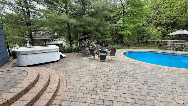 8 Rolling Way, New City, NY 10956 - view of swimming pool featuring a hot tub, a patio area, and a fenced backyard