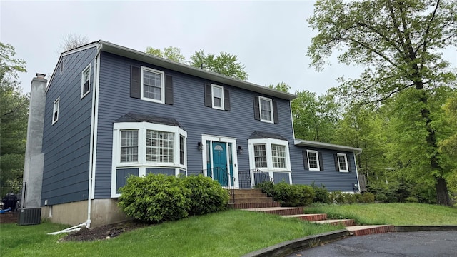 8 Rolling Way, New City, NY 10956 - colonial house with central AC and a front lawn
