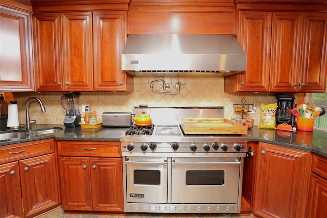 8 Rolling Way, New City, NY 10956 - kitchen with a sink, dark stone countertops, wall chimney exhaust hood, backsplash, and range with two ovens