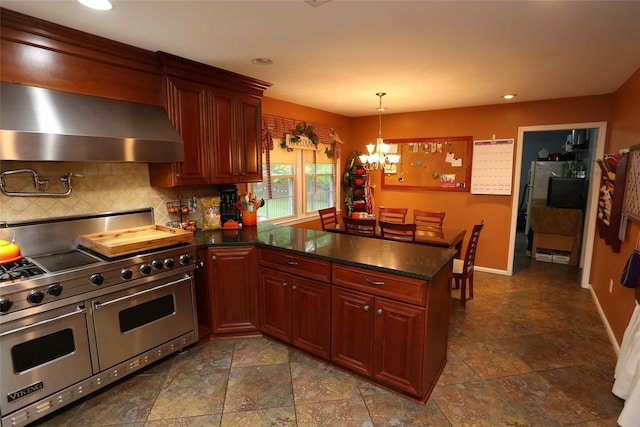 8 Rolling Way, New City, NY 10956 - kitchen featuring double oven range, a peninsula, a chandelier, wall chimney range hood, and dark countertops