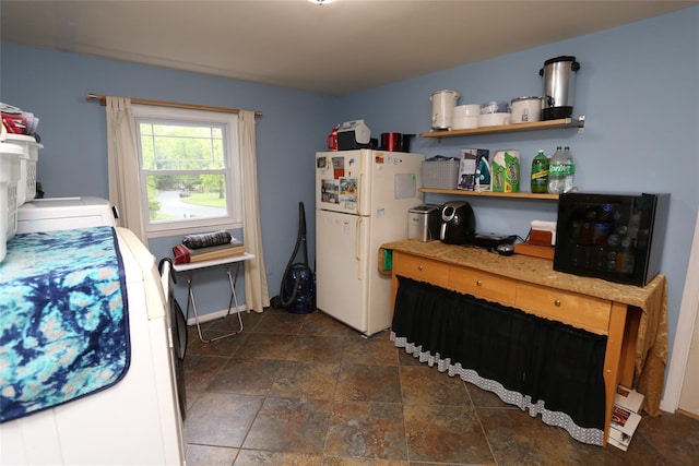 8 Rolling Way, New City, NY 10956 - kitchen featuring freestanding refrigerator, stone finish floor, and washer / clothes dryer