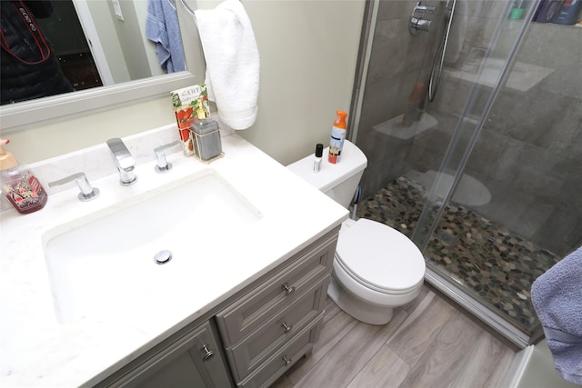 8 Rolling Way, New City, NY 10956 - bathroom with a stall shower, vanity, toilet, and wood finished floors