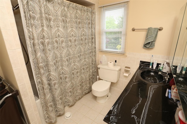 8 Rolling Way, New City, NY 10956 - bathroom with toilet, tile walls, vanity, tile patterned floors, and wainscoting