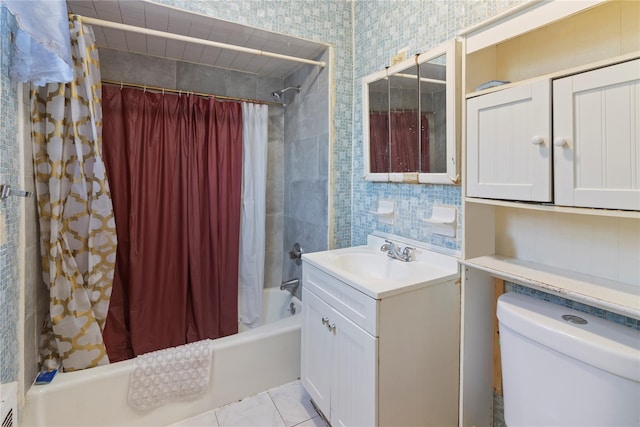 bathroom featuring toilet, shower / bathtub combination with curtain, and vanity