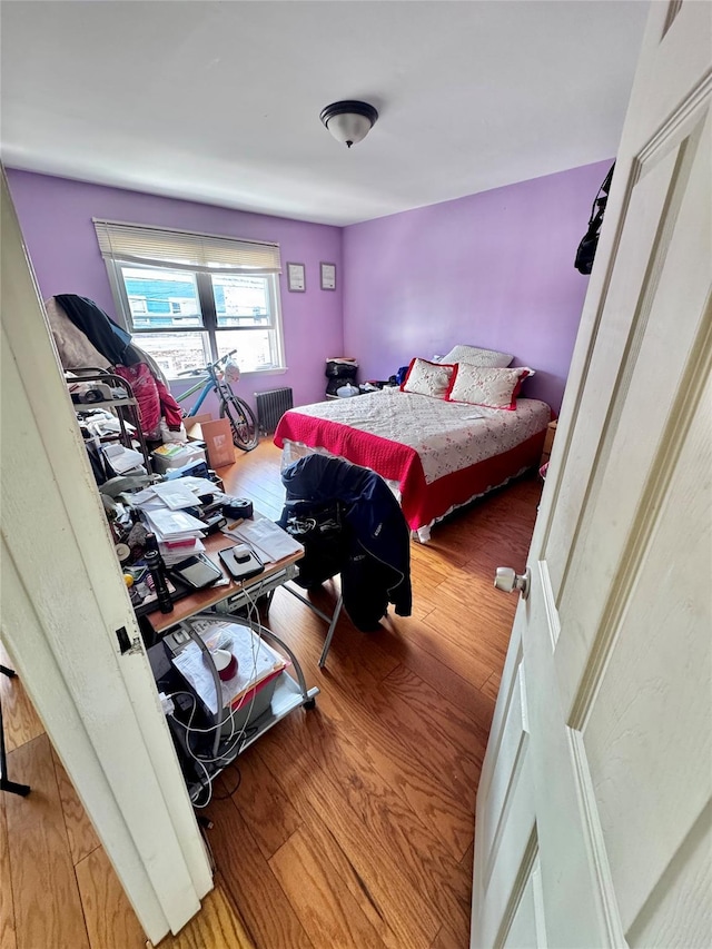 bedroom featuring wood finished floors