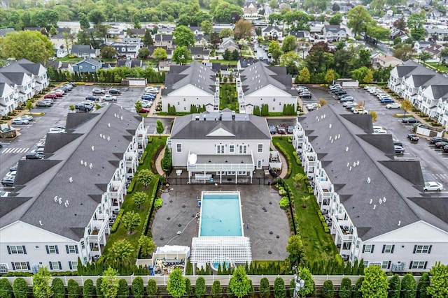 aerial perspective of suburban area with a pool area