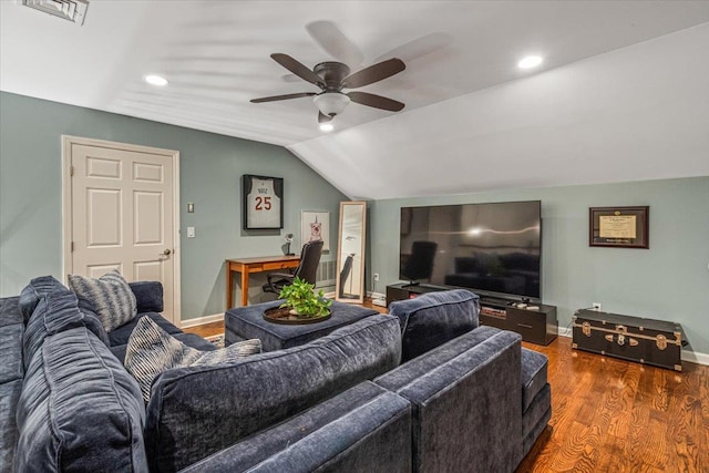 living room featuring vaulted ceiling, a ceiling fan, wood finished floors, baseboards, and recessed lighting