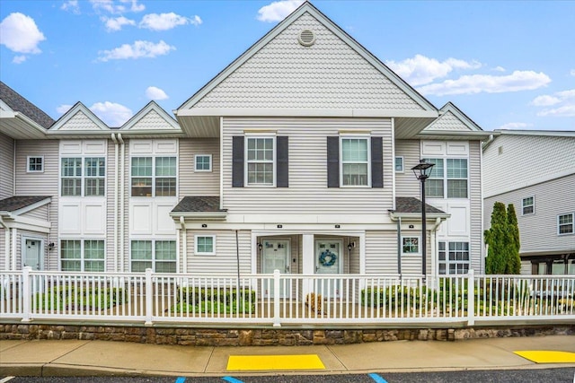 view of property with a fenced front yard