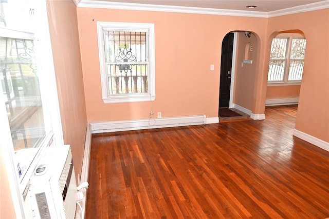 unfurnished room with arched walkways, baseboards, a healthy amount of sunlight, and baseboard heating
