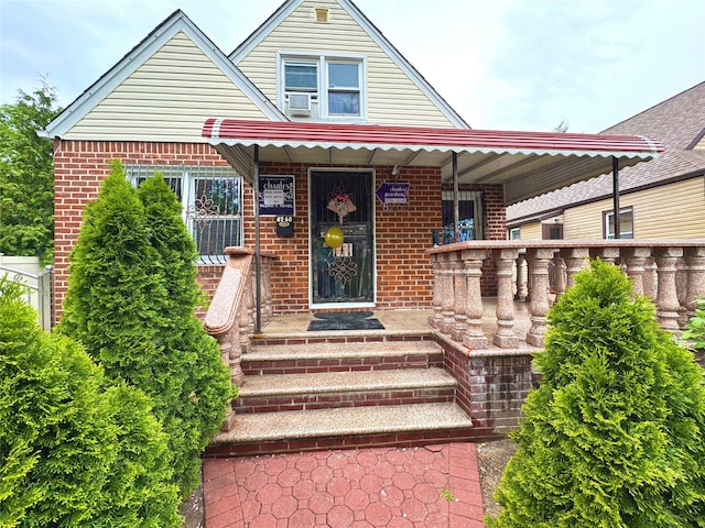 8260 266th St, Glen Oaks, NY 11004 - view of front of home with brick siding