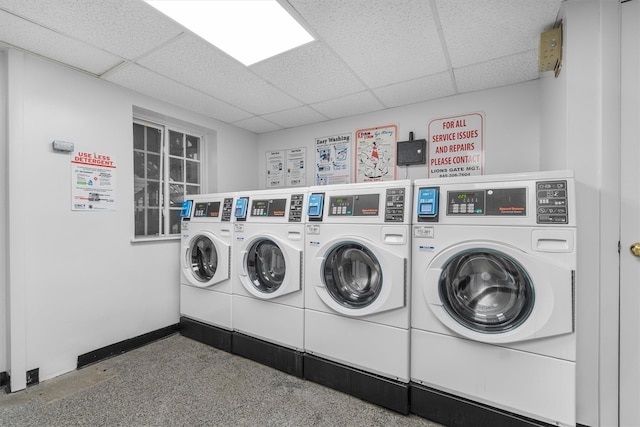 311 Fox Run Ln, Carmel, NY 10512 - communal laundry room with washer and clothes dryer and baseboards