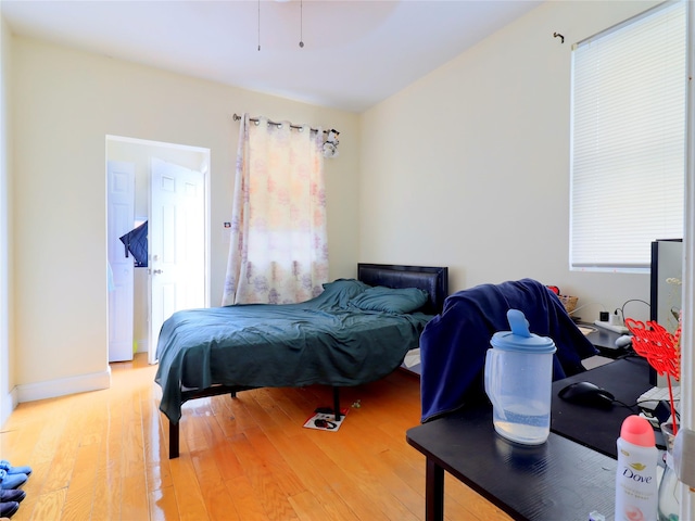 bedroom with light wood-style floors