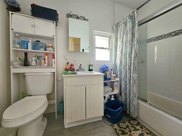 bathroom with tile patterned flooring, shower / bath combo, toilet, and vanity