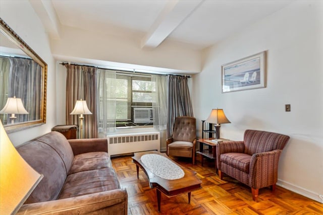 62-15 53rd Ave Unit Lgd, Maspeth, NY 11378 - sitting room featuring radiator heating unit, beam ceiling, and baseboards