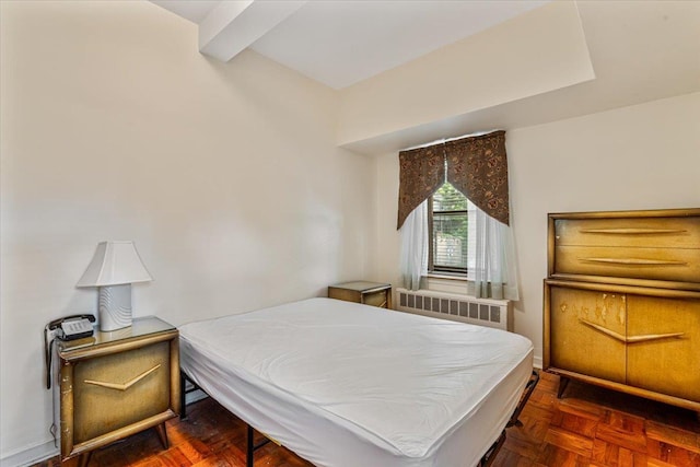 62-15 53rd Ave Unit Lgd, Maspeth, NY 11378 - bedroom featuring radiator and beamed ceiling