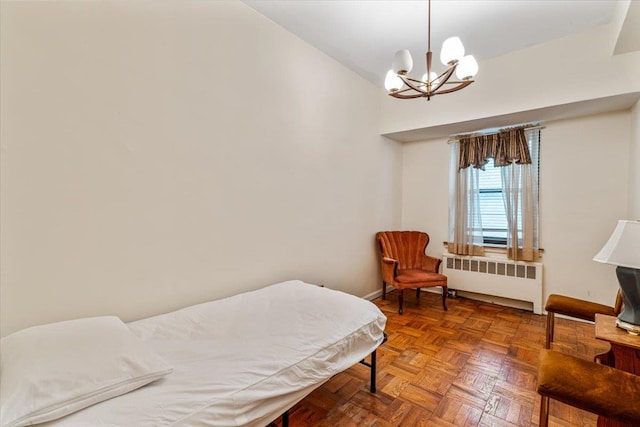 62-15 53rd Ave Unit Lgd, Maspeth, NY 11378 - bedroom featuring radiator, a chandelier, and baseboards