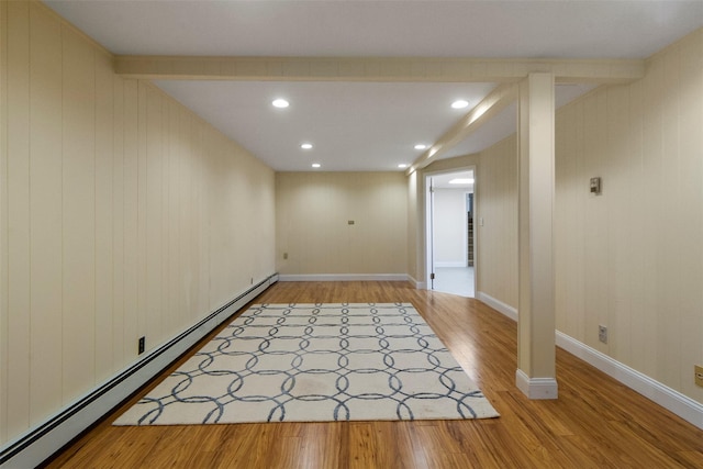 7 Cobblestone Ln, Cortlandt Manor, NY 10567 - unfurnished room featuring baseboard heating, light wood-style floors, and recessed lighting