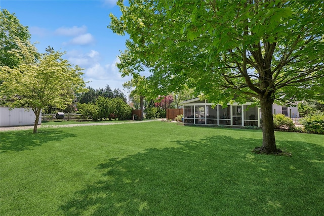 264 Washington Ave, Jamesport, NY 11947 - view of yard featuring a sunroom