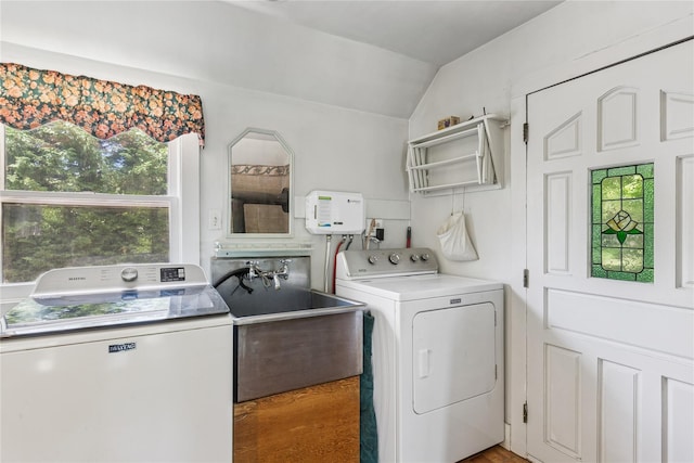 264 Washington Ave, Jamesport, NY 11947 - washroom with separate washer and dryer and wood finished floors