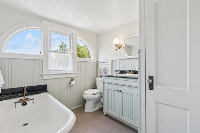 264 Washington Ave, Jamesport, NY 11947 - bathroom featuring a freestanding bath, vanity, and wood ceiling