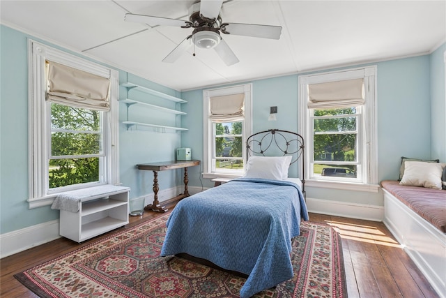264 Washington Ave, Jamesport, NY 11947 - bedroom with hardwood / wood-style floors, ceiling fan, and ornamental molding