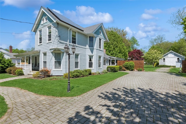 264 Washington Ave, Jamesport, NY 11947 - view of front facade featuring a front yard