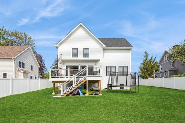 4 Haring Ave, Sparkill, NY 10976 - rear view of house featuring stairs, a trampoline, and a deck